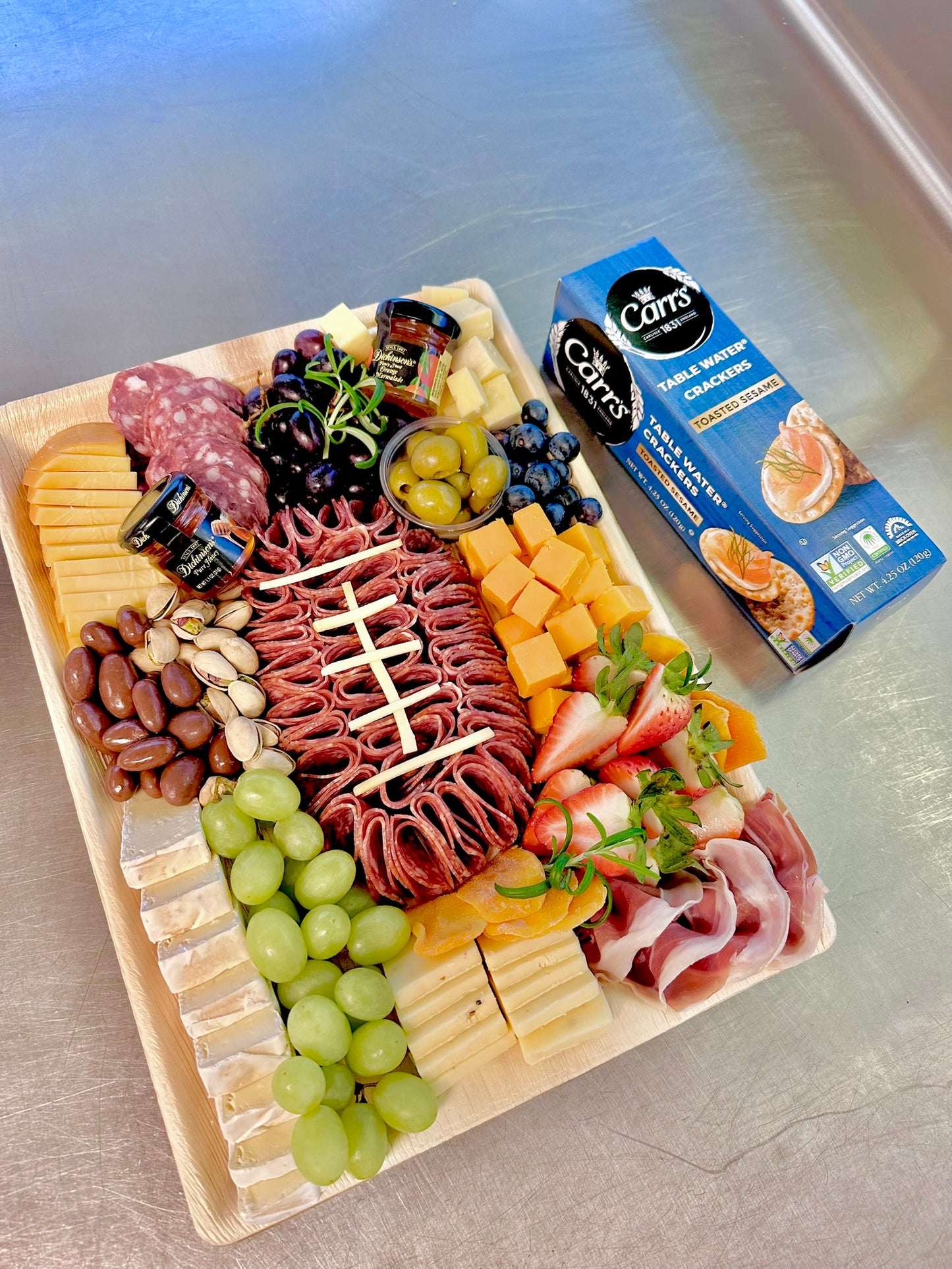 football_shaped_salami_charcuterie_board