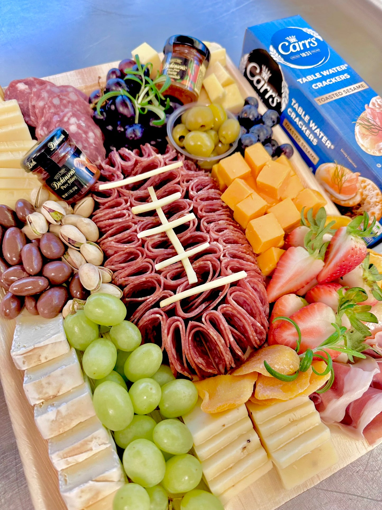 football_shaped_salami_charcuterie_board