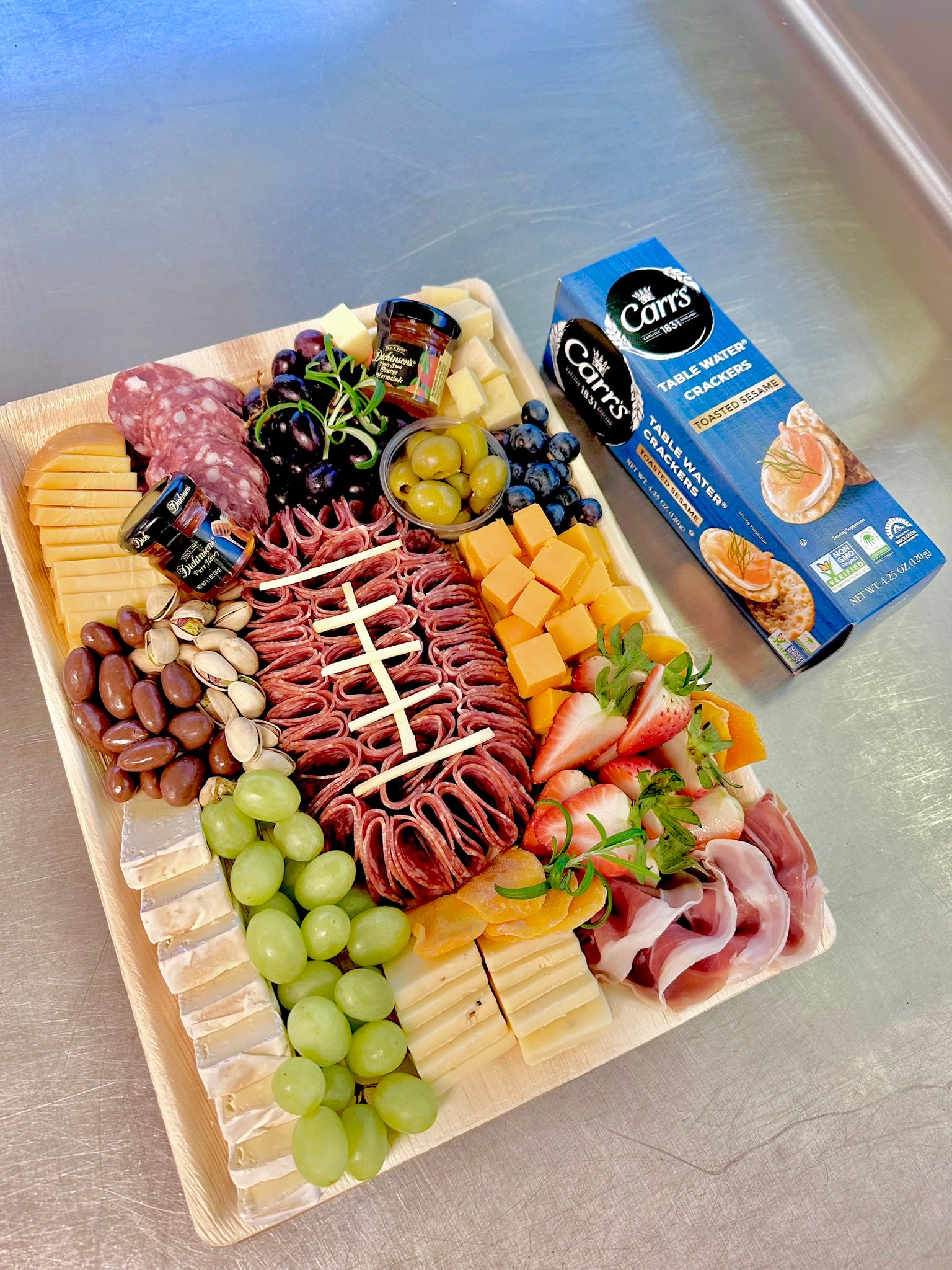 football_shaped_salami_charcuterie_board